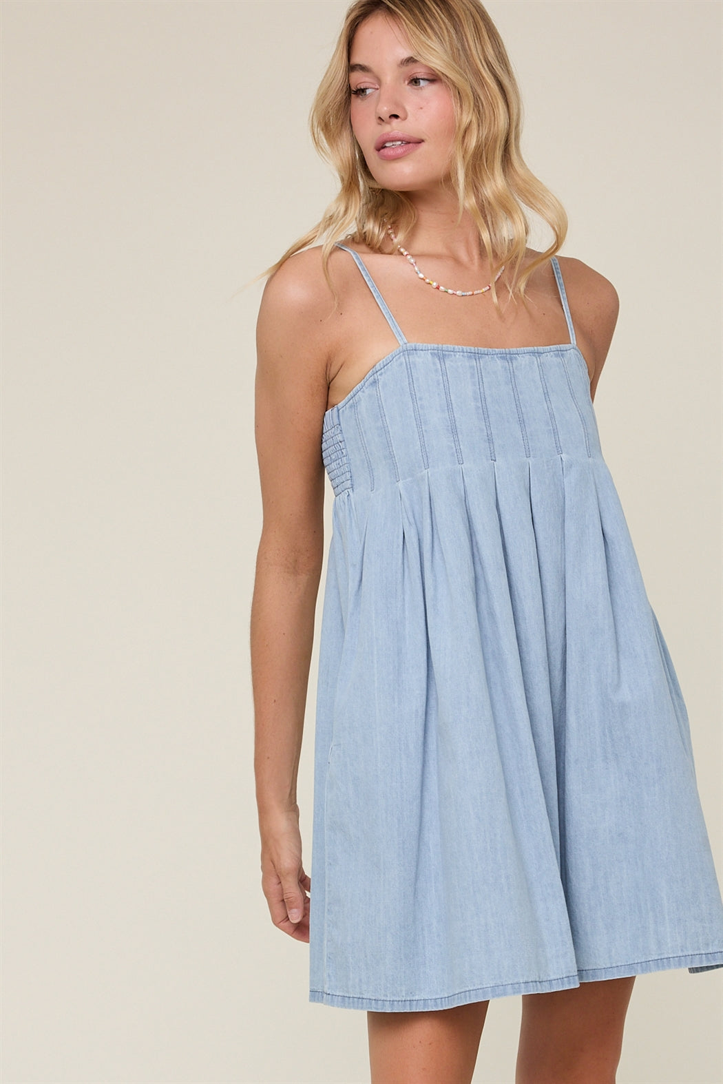 PLEATED DENIM MINI DRESS