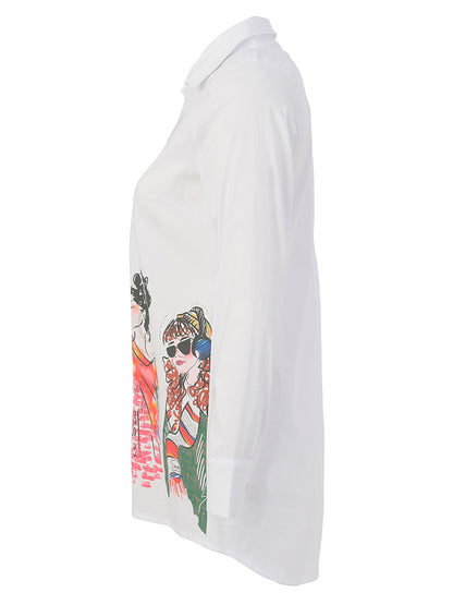 A white long-sleeve button-up shirt shown from the side, featuring a colorful graphic print of two illustrated women on the lower front.
